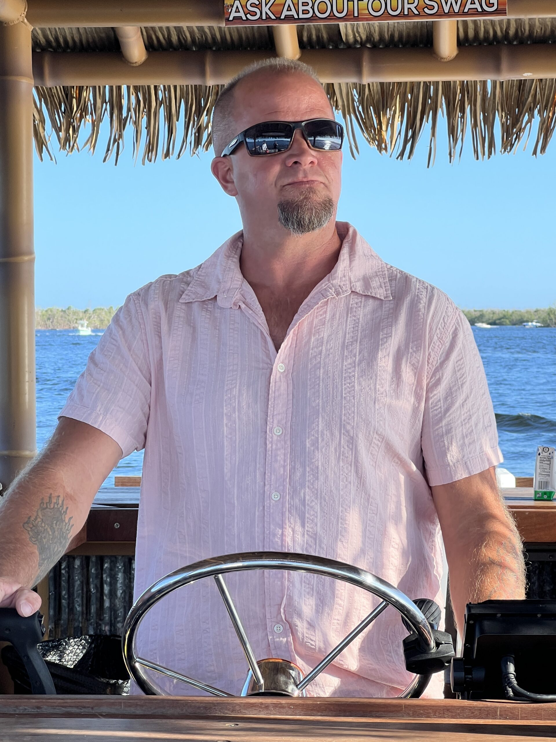 Captain driving the Big Tiki Tours FMB boat
