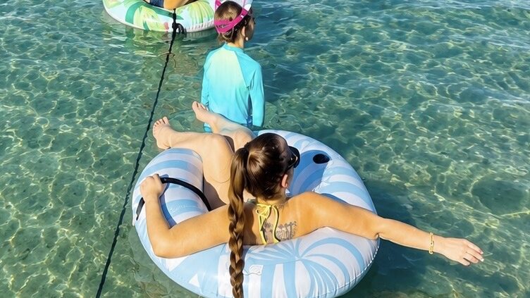 Guests enjoying sandbar time during a Big Tiki Tours 3 Hour Excursion